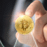 close-up-hand-holding-coin - Новый Компаньон