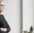 young-woman-looking-on-window - Новый Компаньон
