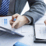businessmen-in-elegant-suits-at-a-business-meeting-discussing-a-new-project-in-the-office - Новый Компаньон