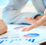 coworkers-talking-about-business-report-close-up - Новый Компаньон