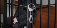 человек за решеткой суд наручники - Новый Компаньон