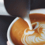 person-serving-cup-coffee - Новый Компаньон