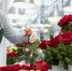 senior-woman-looking-after-beautiful-flowers - Новый Компаньон